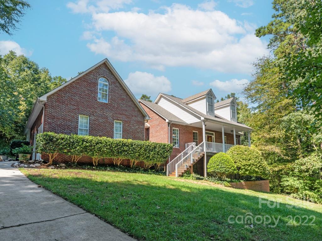 379 Point Carpenter Road Indian Land, SC 29707 - Photo 3 of 47 a front view of a house with a yard