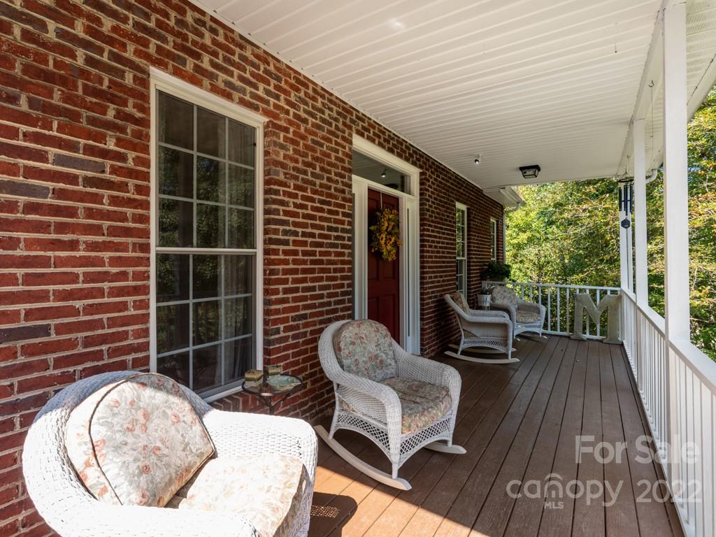 379 Point Carpenter Road Indian Land, SC 29707 - Photo 5 of 47 a balcony with furniture and wooden floor