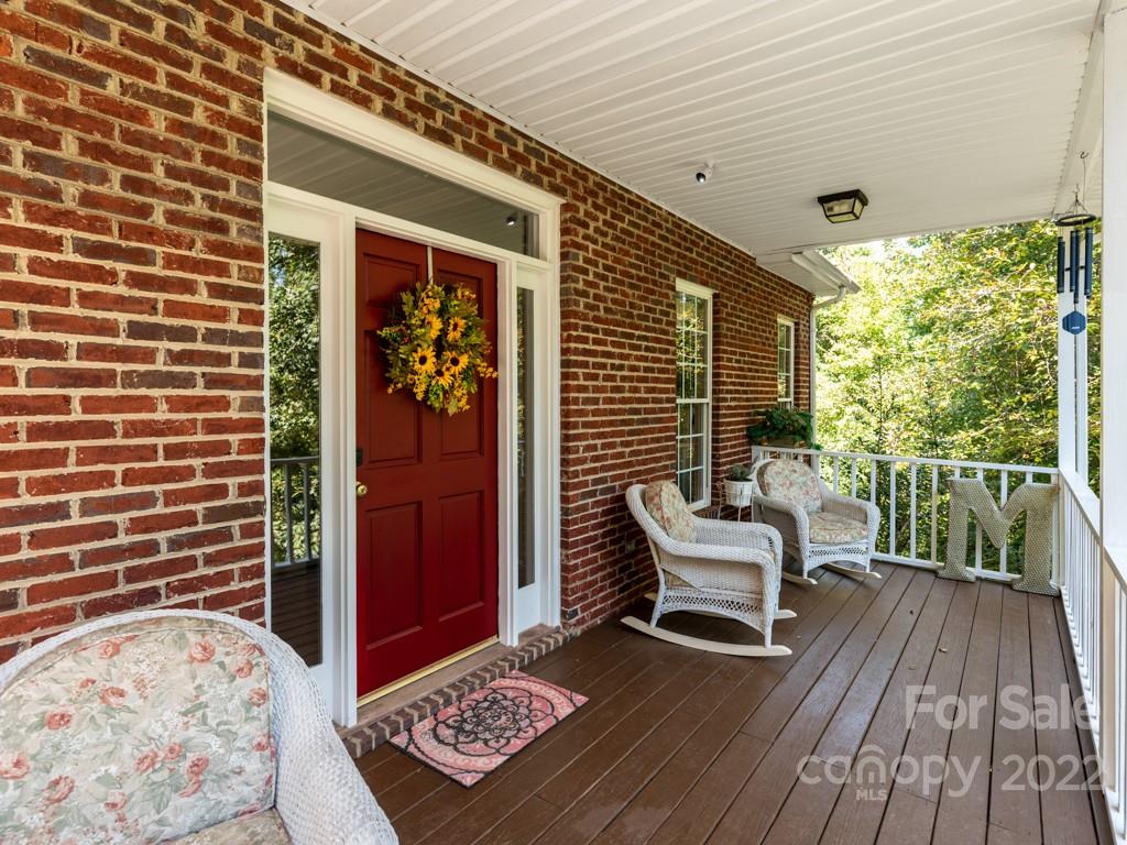 379 Point Carpenter Road Indian Land, SC 29707 - Photo 8 of 47 a balcony with chairs and with wooden floor