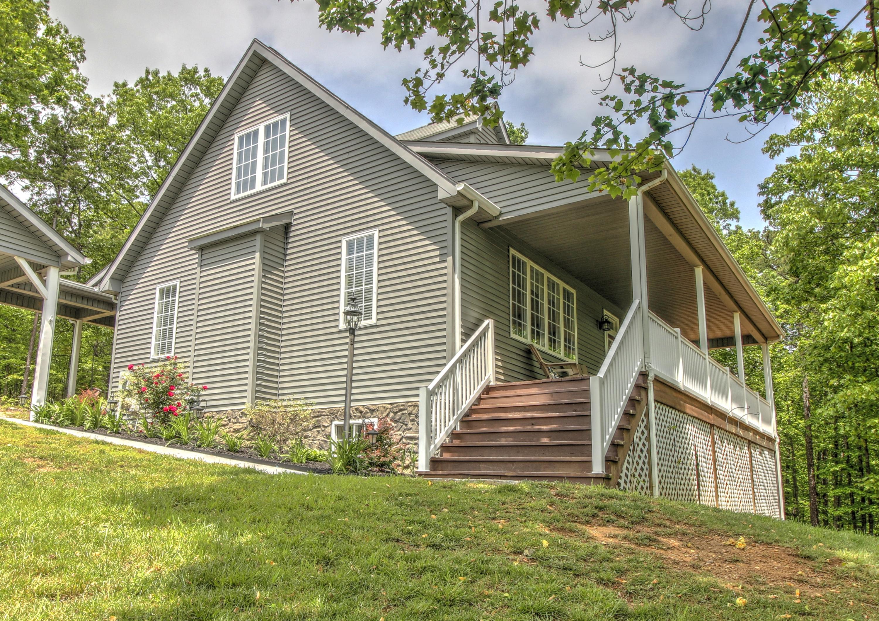 1335 Woodhaven Estates Road Blue Ridge, VA 24064 - Photo 2 of 45 a view of a house with a yard