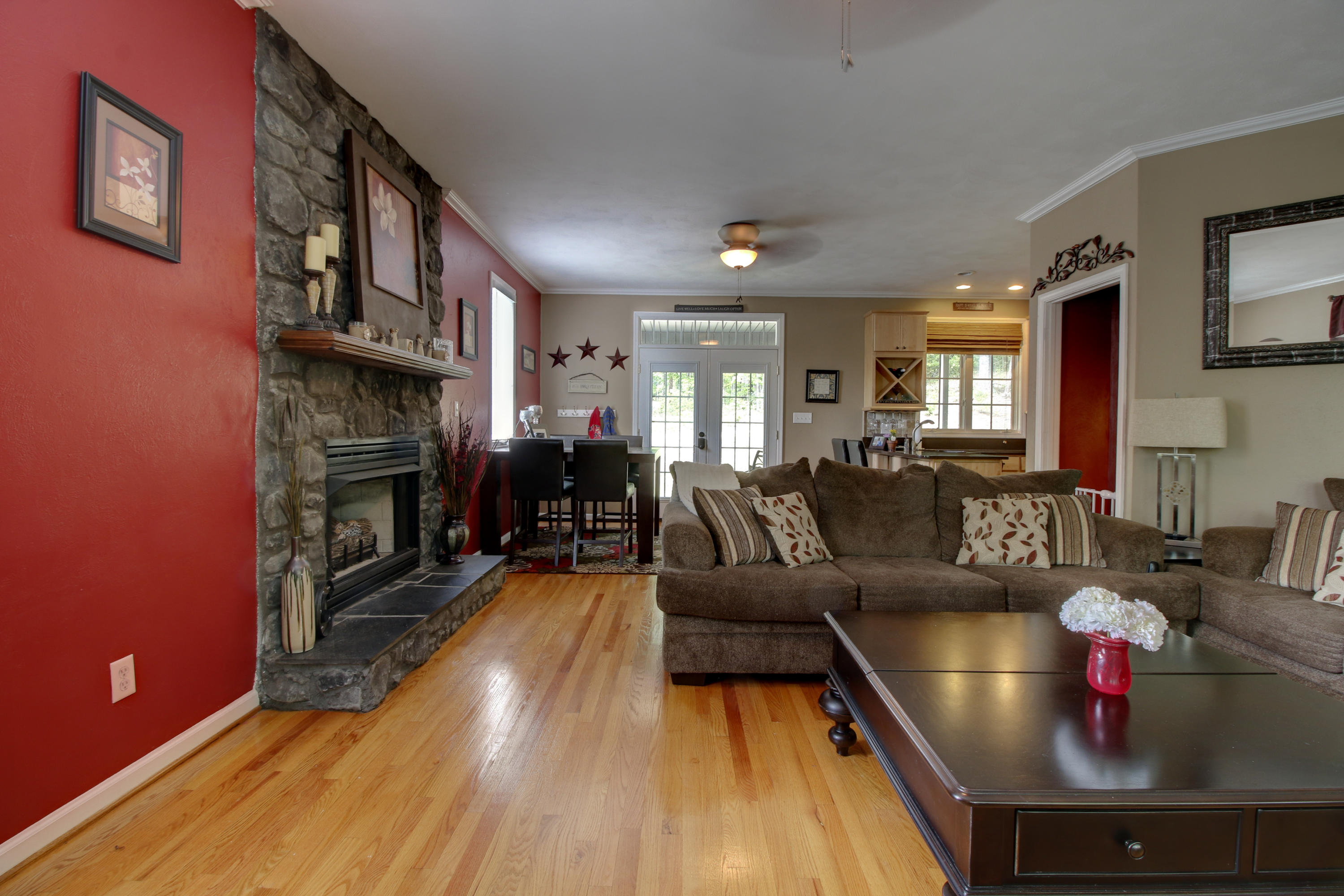 1335 Woodhaven Estates Road Blue Ridge, VA 24064 - Photo 16 of 45 a living room with furniture and a fireplace