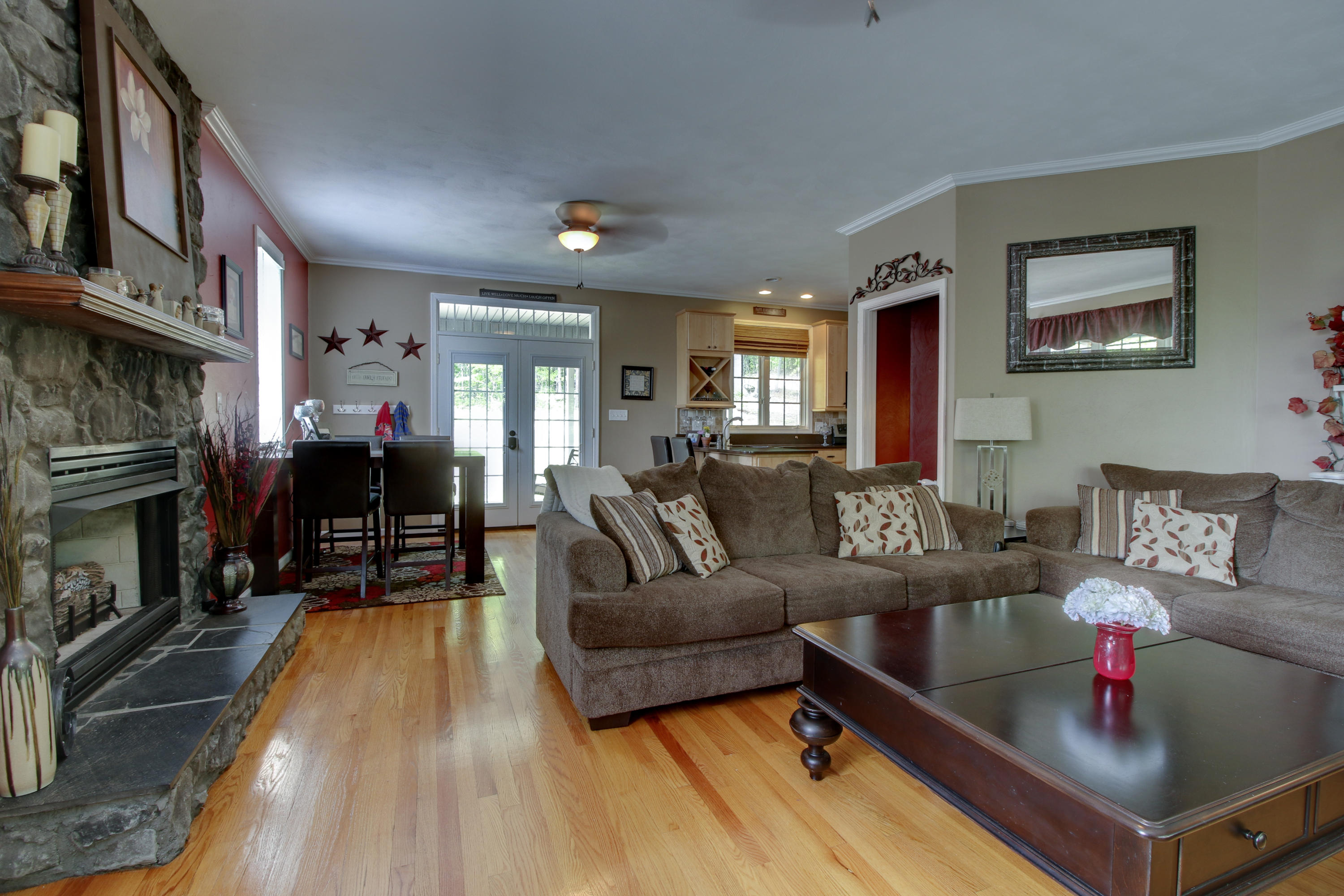 1335 Woodhaven Estates Road Blue Ridge, VA 24064 - Photo 18 of 45 a living room with furniture and a fireplace