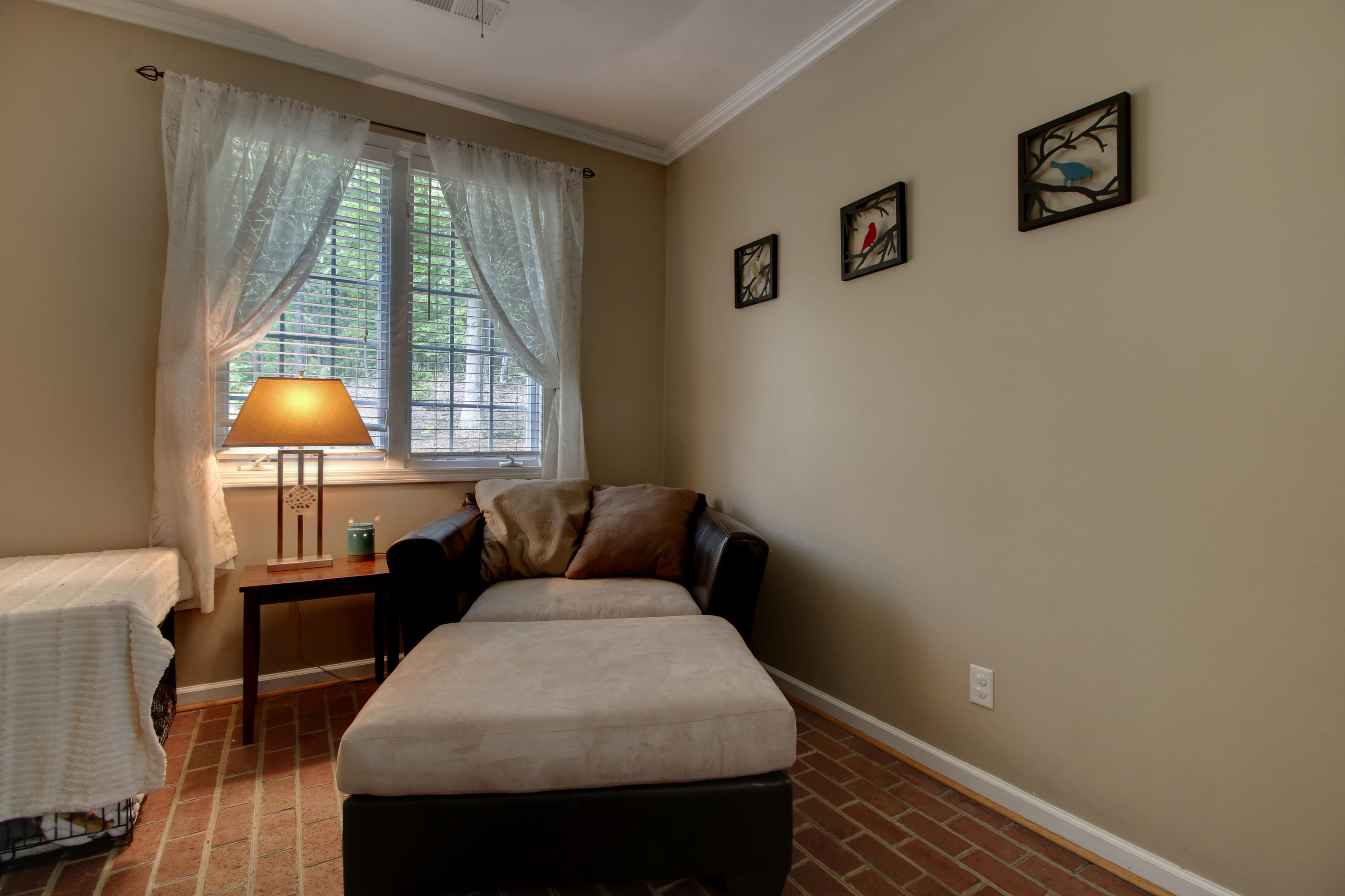 1335 Woodhaven Estates Road Blue Ridge, VA 24064 - Photo 24 of 45 a bedroom with a bed and a window