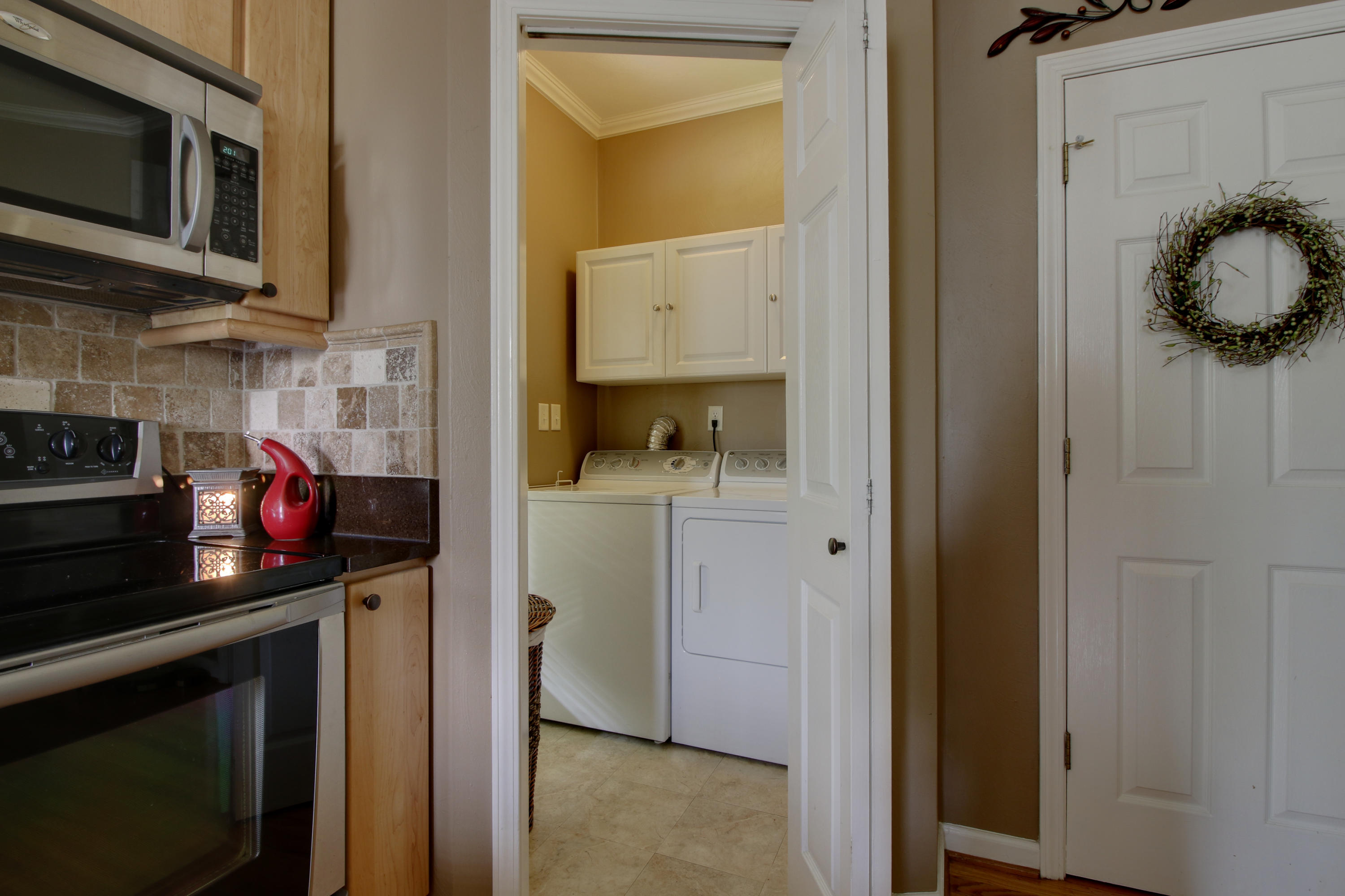 1335 Woodhaven Estates Road Blue Ridge, VA 24064 - Photo 33 of 45 a kitchen with stainless steel appliances a stove and a microwave