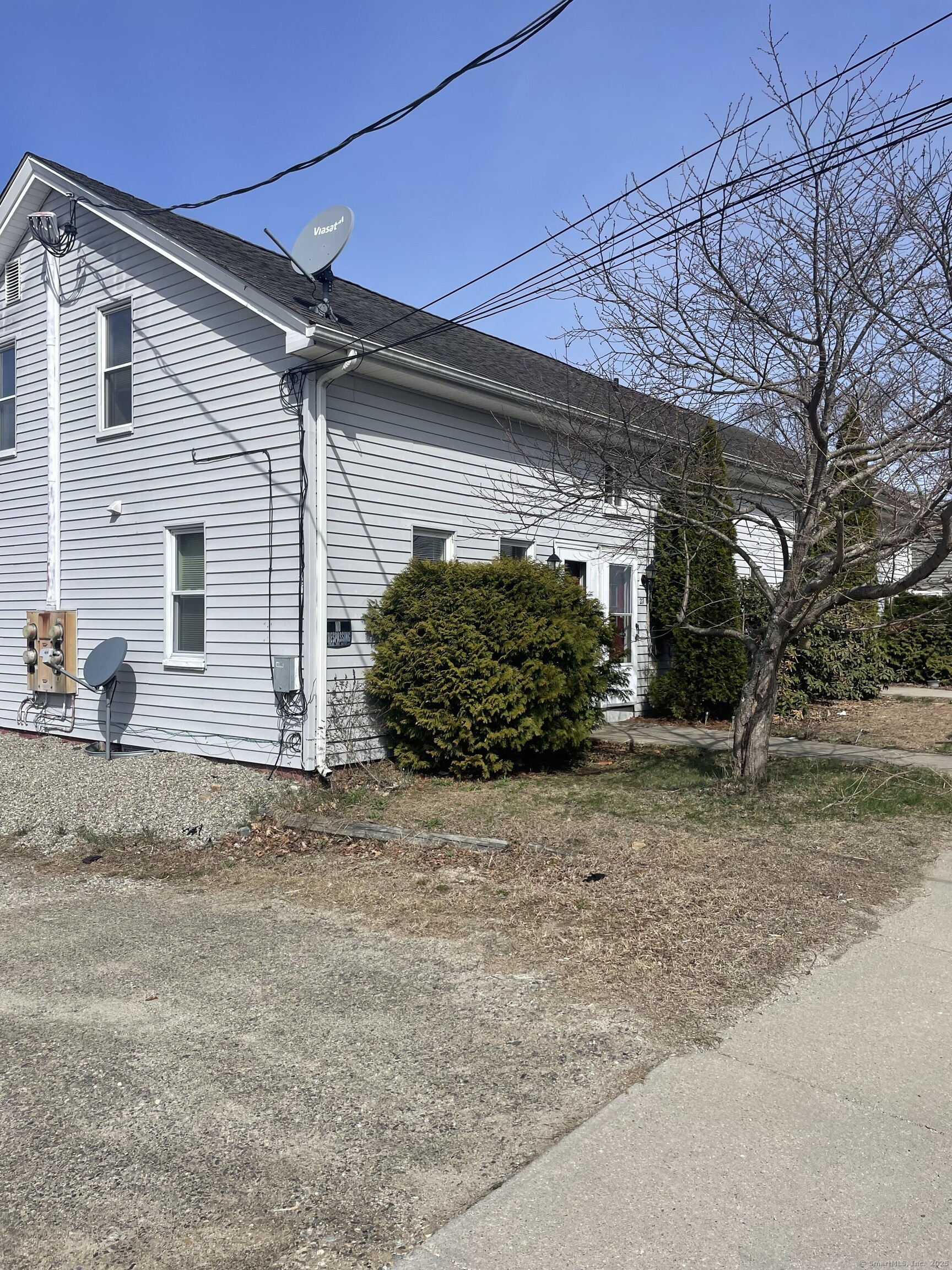 27 North Walnut Street Plainfield, CT 06239 - Photo 1 of 1 a view of a house with a yard