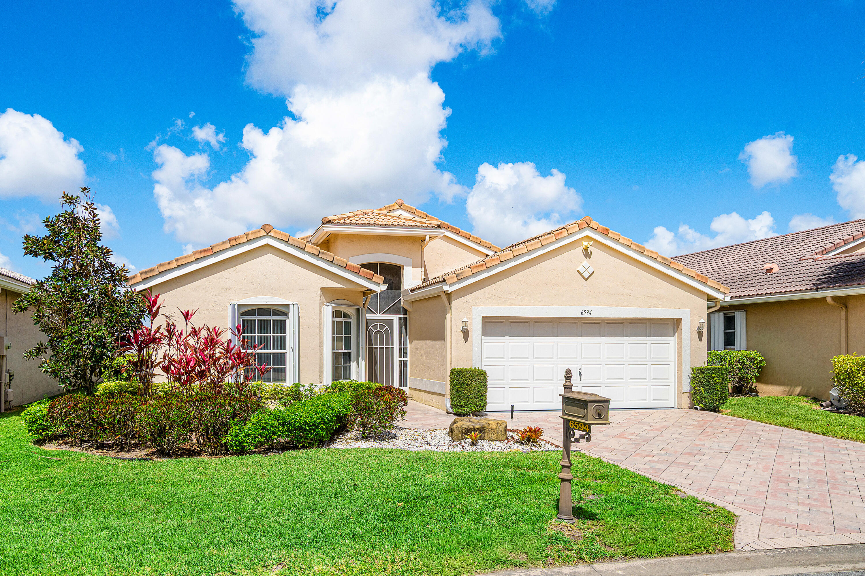 6594 Sun River Road Boynton Beach, FL 33437 - Photo 37 of 37 Front Exposure