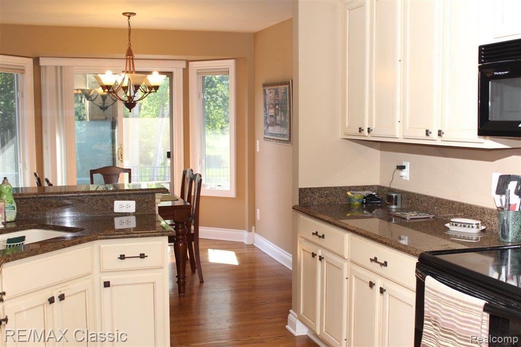 1278 North Lilley Road Canton, MI 48187 - Photo 12 of 25 Kitchen into Nook