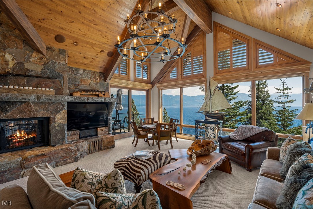 444 Gonowabie Road Crystal Bay, NV 89402 - Photo 2 of 50 a living room with furniture a fireplace and a flat screen tv