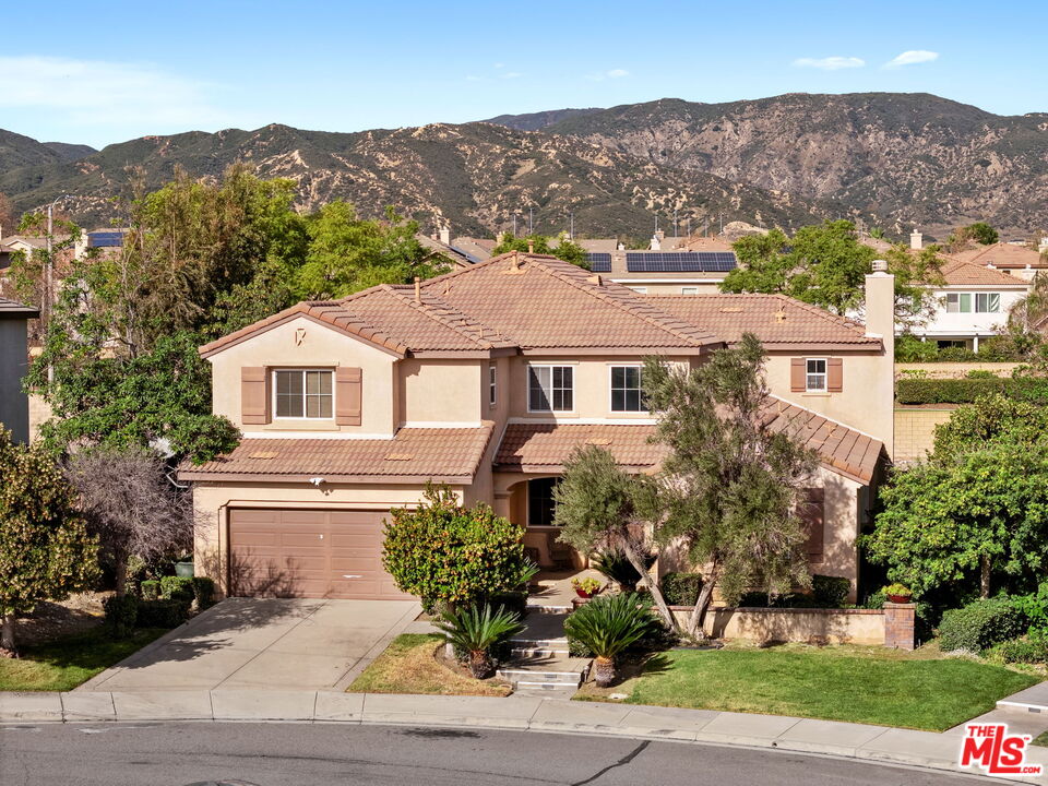 18080 Tanzanite Road San Bernardino, CA 92407 - Photo 1 of 49 front view of a house with a yard