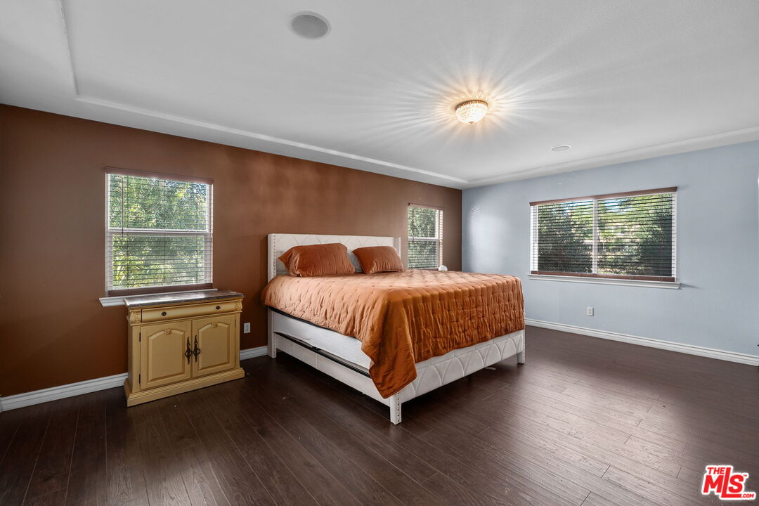 18080 Tanzanite Road San Bernardino, CA 92407 - Photo 24 of 49 a bedroom with a bed and a window