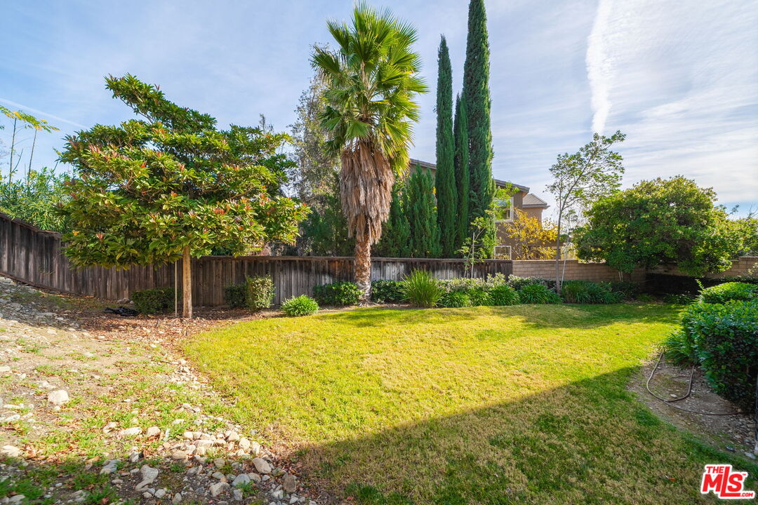 18080 Tanzanite Road San Bernardino, CA 92407 - Photo 33 of 49 a house with swimming pool in front of it