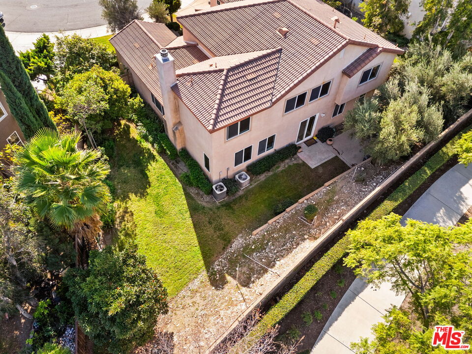 18080 Tanzanite Road San Bernardino, CA 92407 - Photo 37 of 49 a aerial view of a house with a yard
