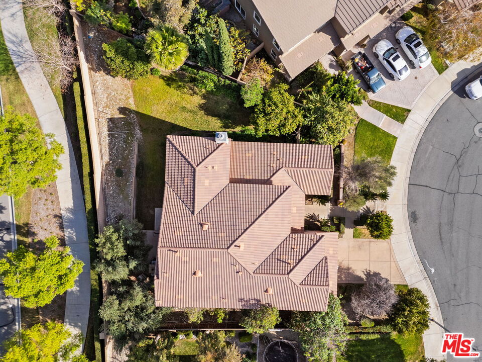 18080 Tanzanite Road San Bernardino, CA 92407 - Photo 39 of 49 an aerial view of a house with a yard and large tree
