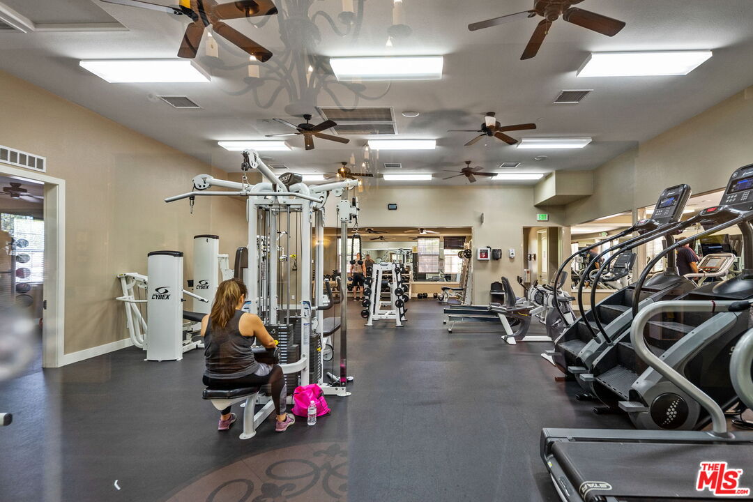 18080 Tanzanite Road San Bernardino, CA 92407 - Photo 45 of 49 a view of a room with gym equipment