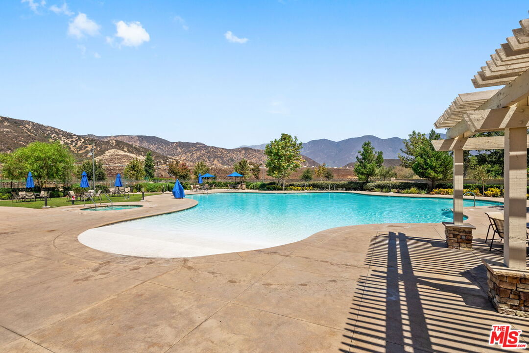 18080 Tanzanite Road San Bernardino, CA 92407 - Photo 48 of 49 a view of swimming pool with lake view and mountain view