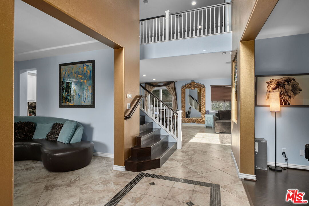 18080 Tanzanite Road San Bernardino, CA 92407 - Photo 5 of 49 a living room with furniture and a rug