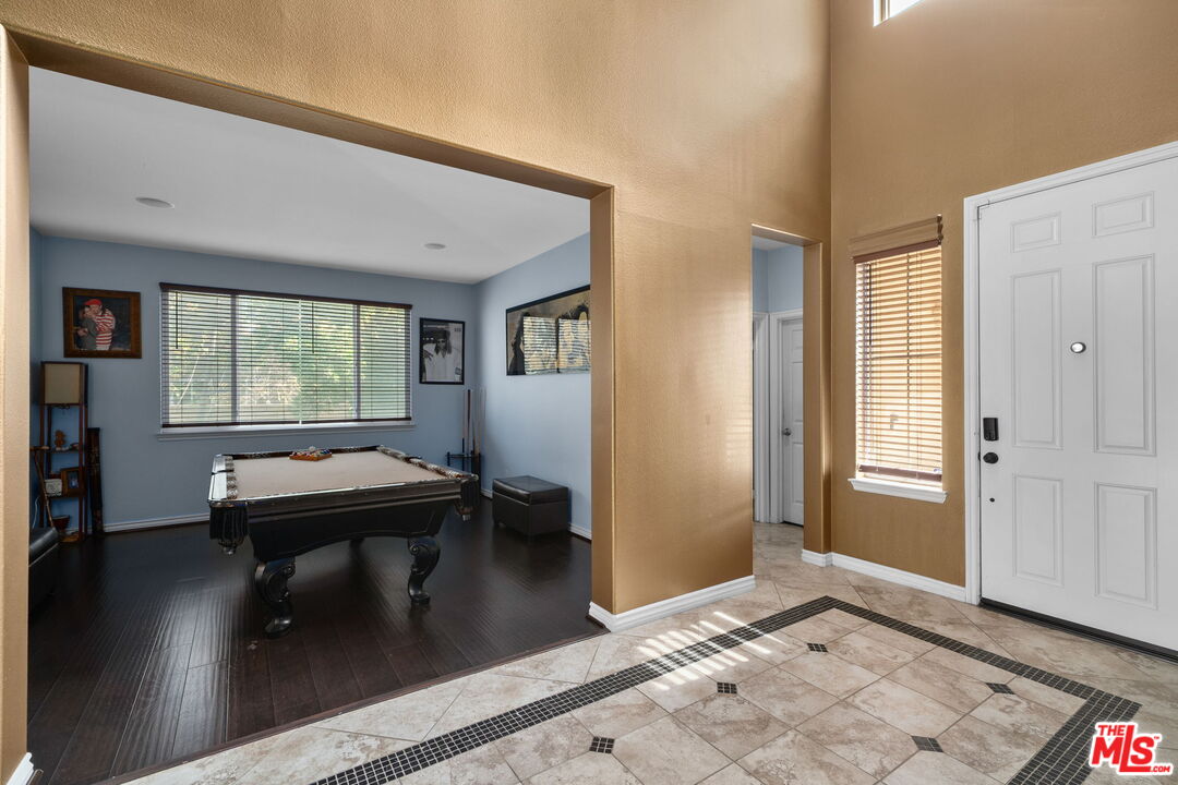 18080 Tanzanite Road San Bernardino, CA 92407 - Photo 6 of 49 a room with pool table and a window