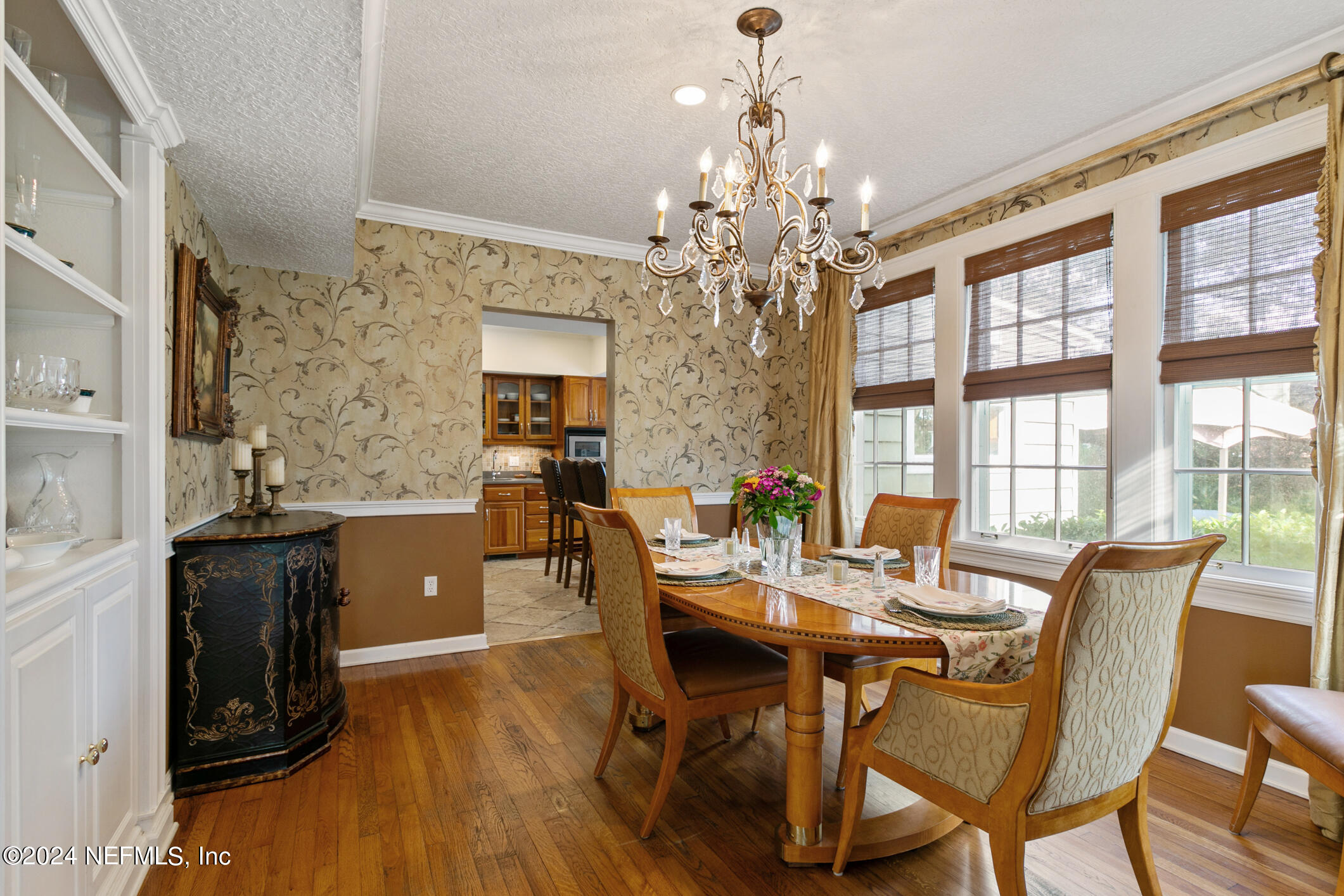 1111 Greenridge Road Jacksonville, FL 32207 - Photo 20 of 73 a view of a dining room with furniture window and wooden floor