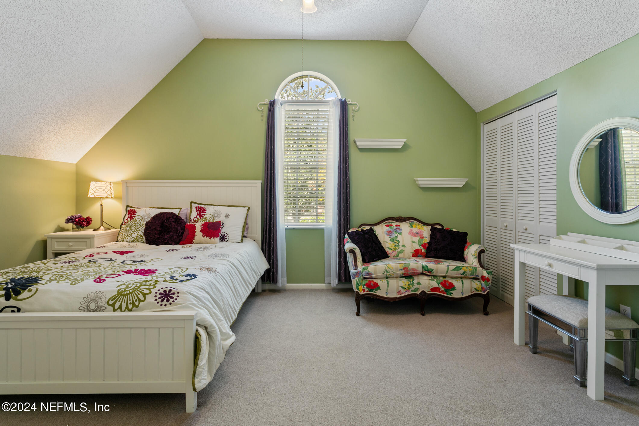 1111 Greenridge Road Jacksonville, FL 32207 - Photo 35 of 73 a bedroom with a bed and gym equipment
