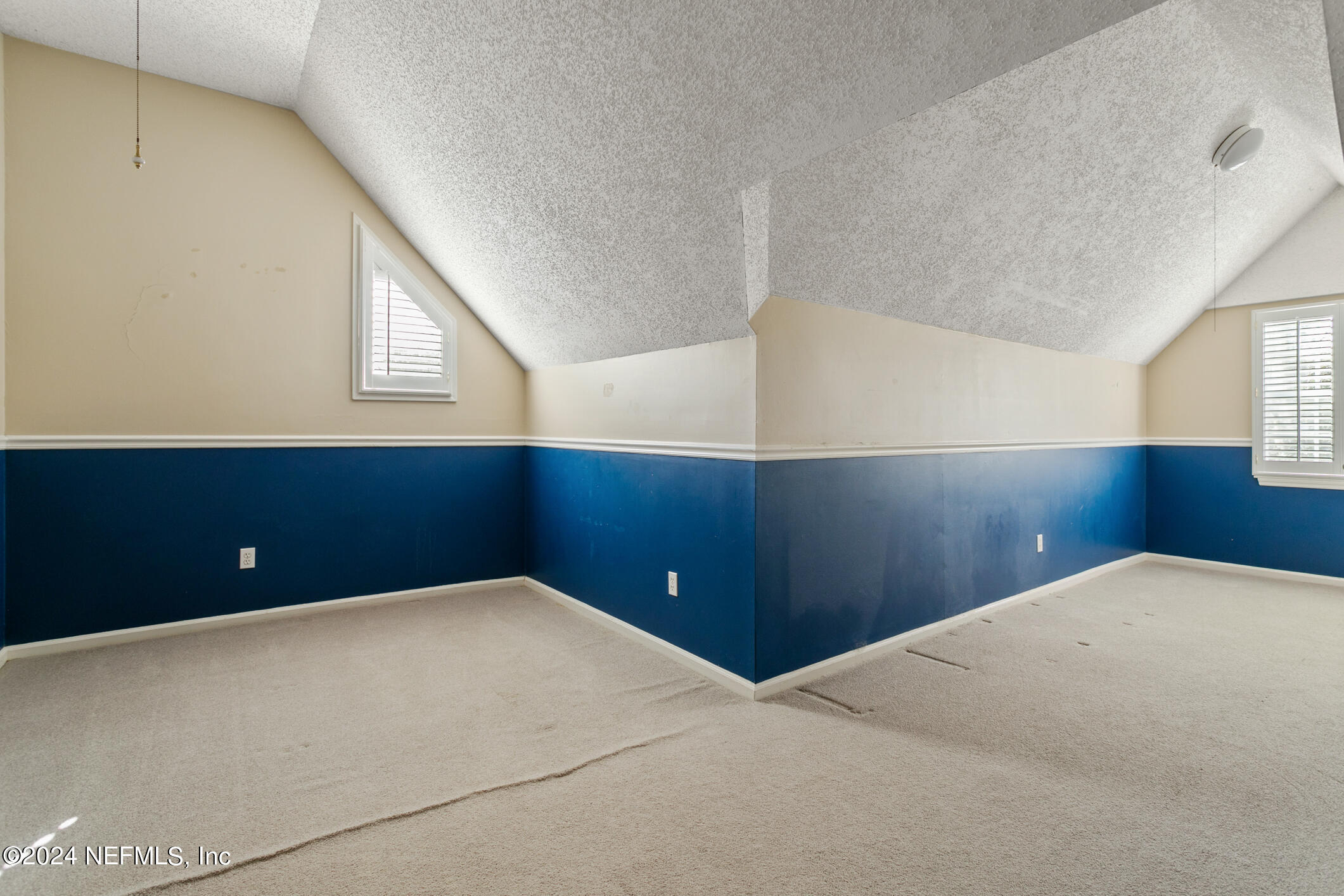 1111 Greenridge Road Jacksonville, FL 32207 - Photo 39 of 73 a view of an empty room and window