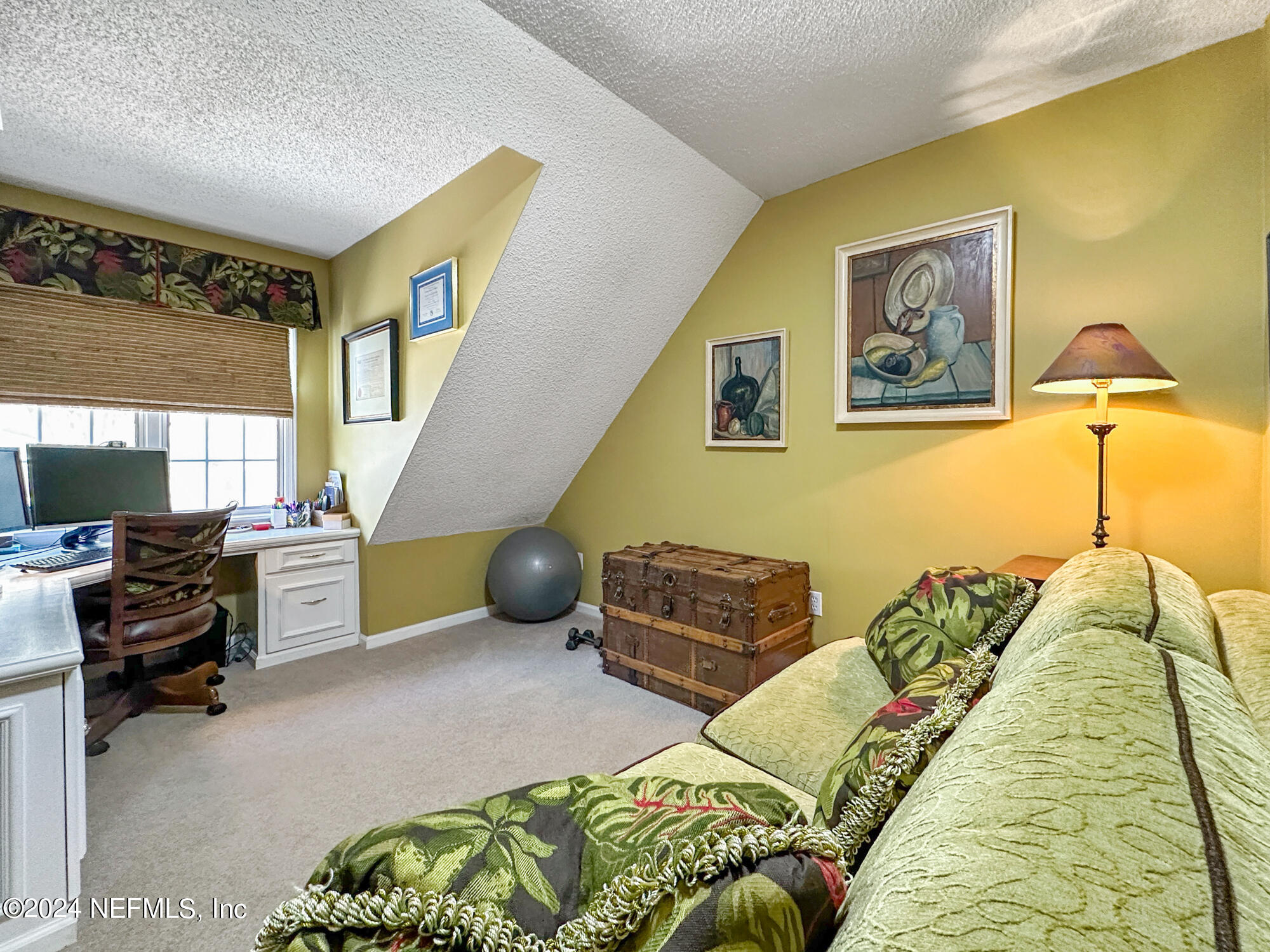 1111 Greenridge Road Jacksonville, FL 32207 - Photo 43 of 73 a bed room with a bed and a chair