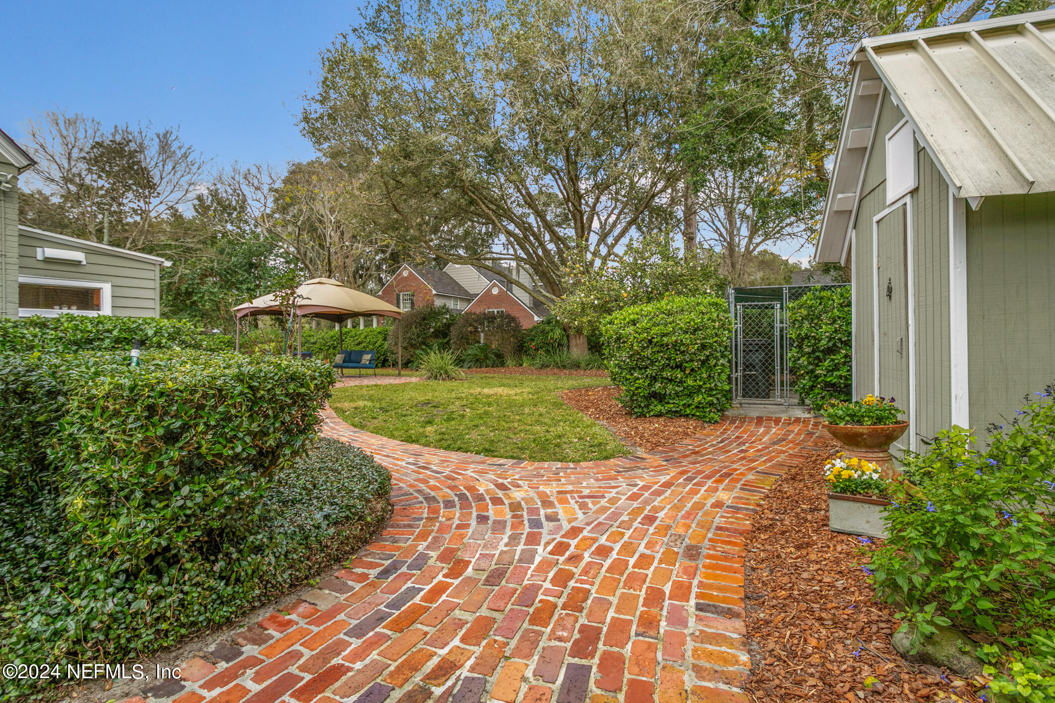 1111 Greenridge Road Jacksonville, FL 32207 - Photo 47 of 73 a view of a house with a yard