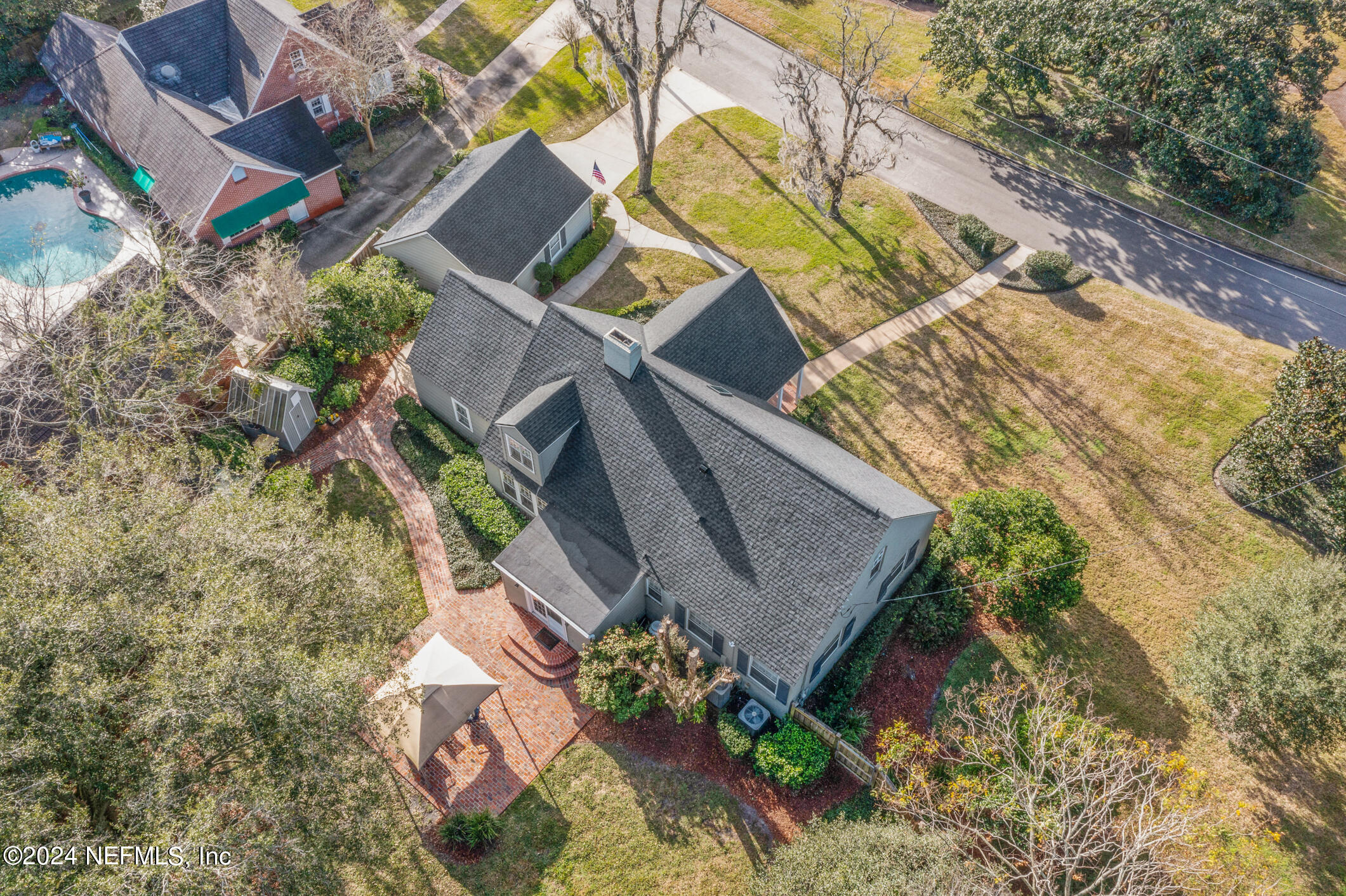 1111 Greenridge Road Jacksonville, FL 32207 - Photo 6 of 73 an aerial view of a house with a yard and sitting space