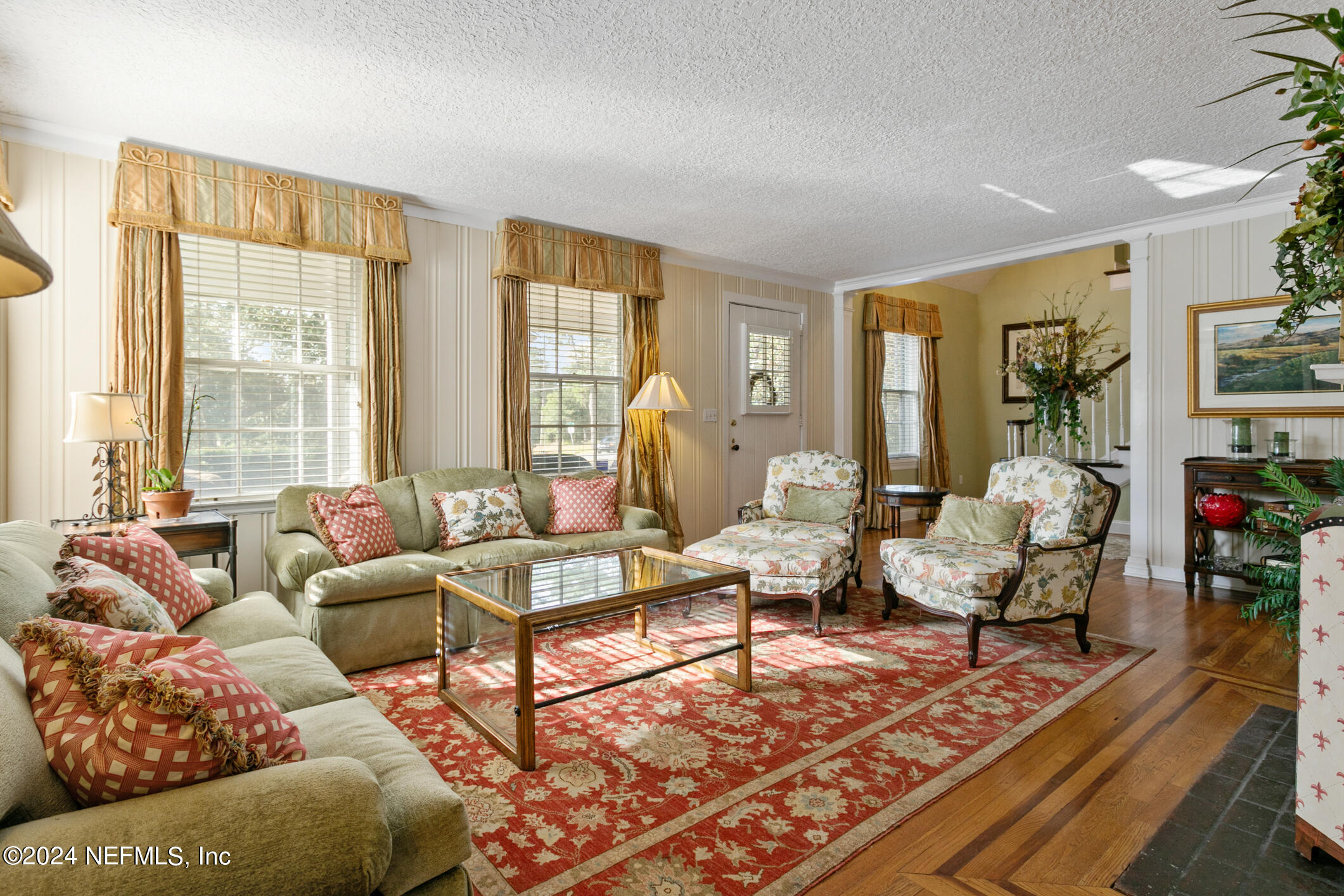 1111 Greenridge Road Jacksonville, FL 32207 - Photo 8 of 73 a living room with furniture and a large window