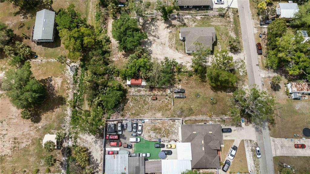 3rd Ave Avenue Orlando, FL 32820 - Photo 13 of 15 an aerial view of residential houses with outdoor space