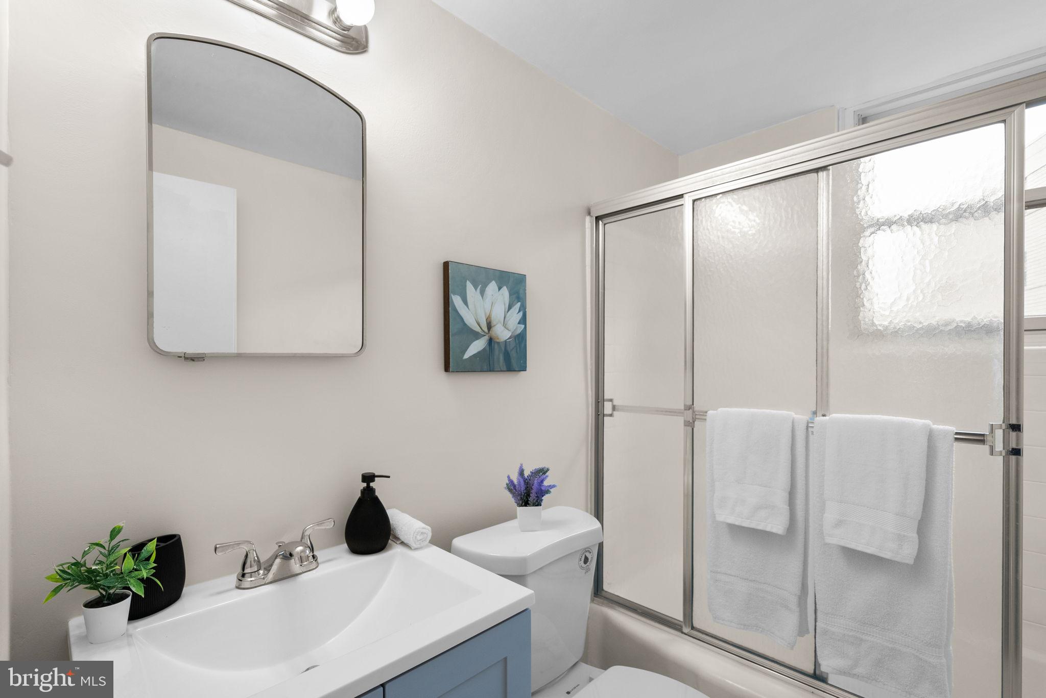 3025 Ontario Road Northwest, Unit 407 Washington, DC 20009 - Photo 21 of 28 Serene bathroom with modern touches.