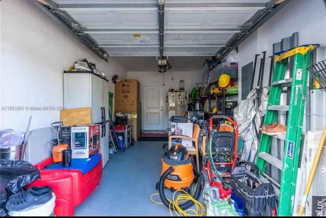a view of a house with basketball court