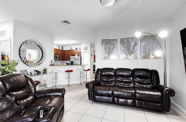 a living room with furniture