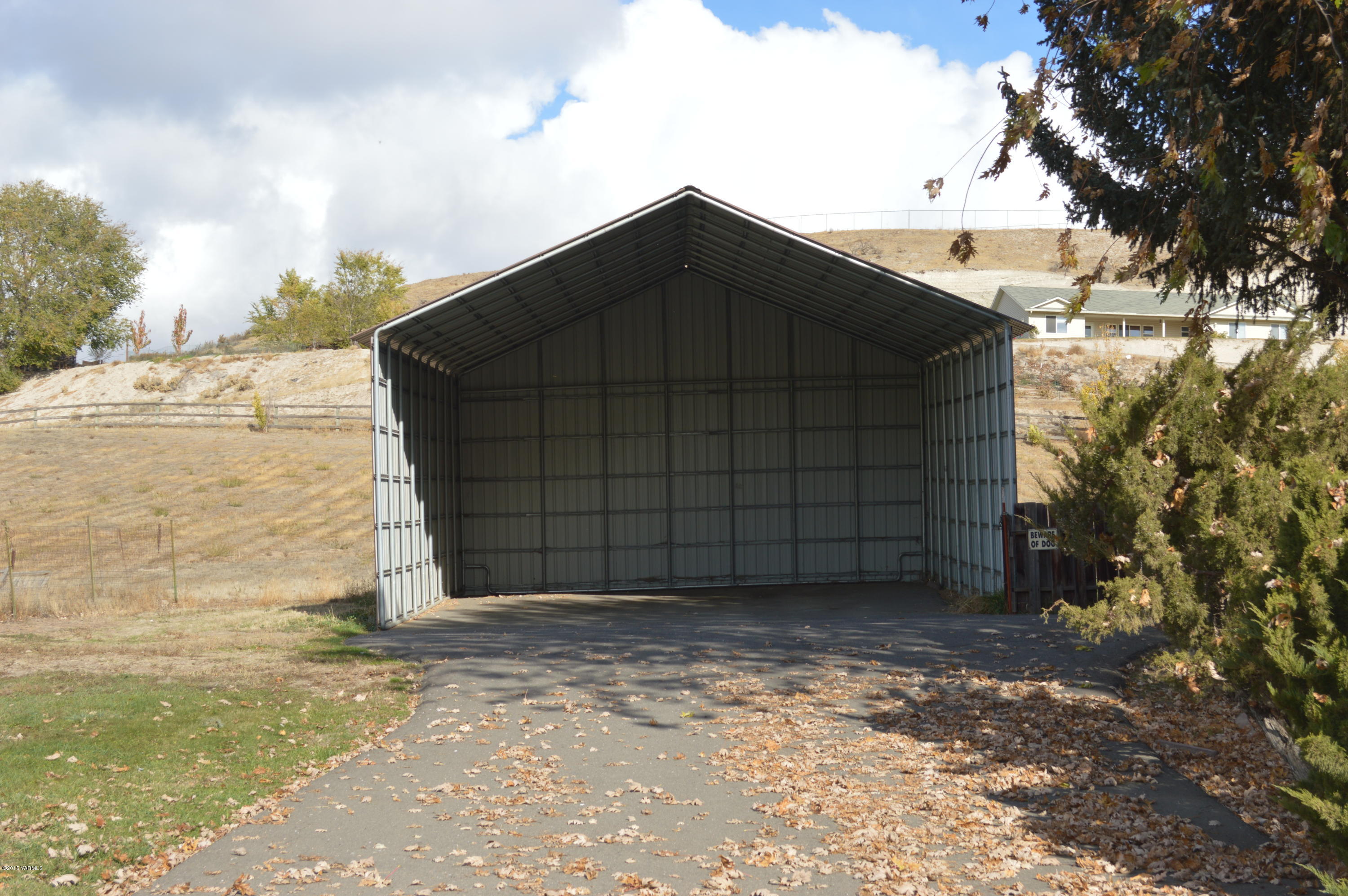 781 Collins Road Selah, WA 98942 - Photo 16 of 23 a front view of a house with a yard