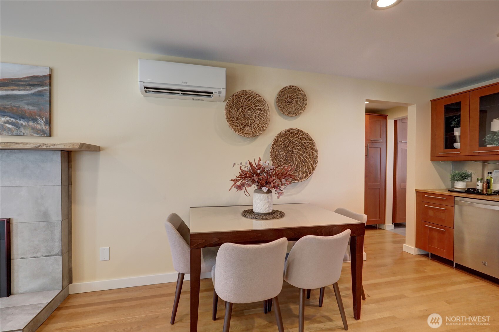 7943 31st Avenue Southwest Seattle, WA 98126 - Photo 7 of 16 a view of a dining room with furniture and wooden floor