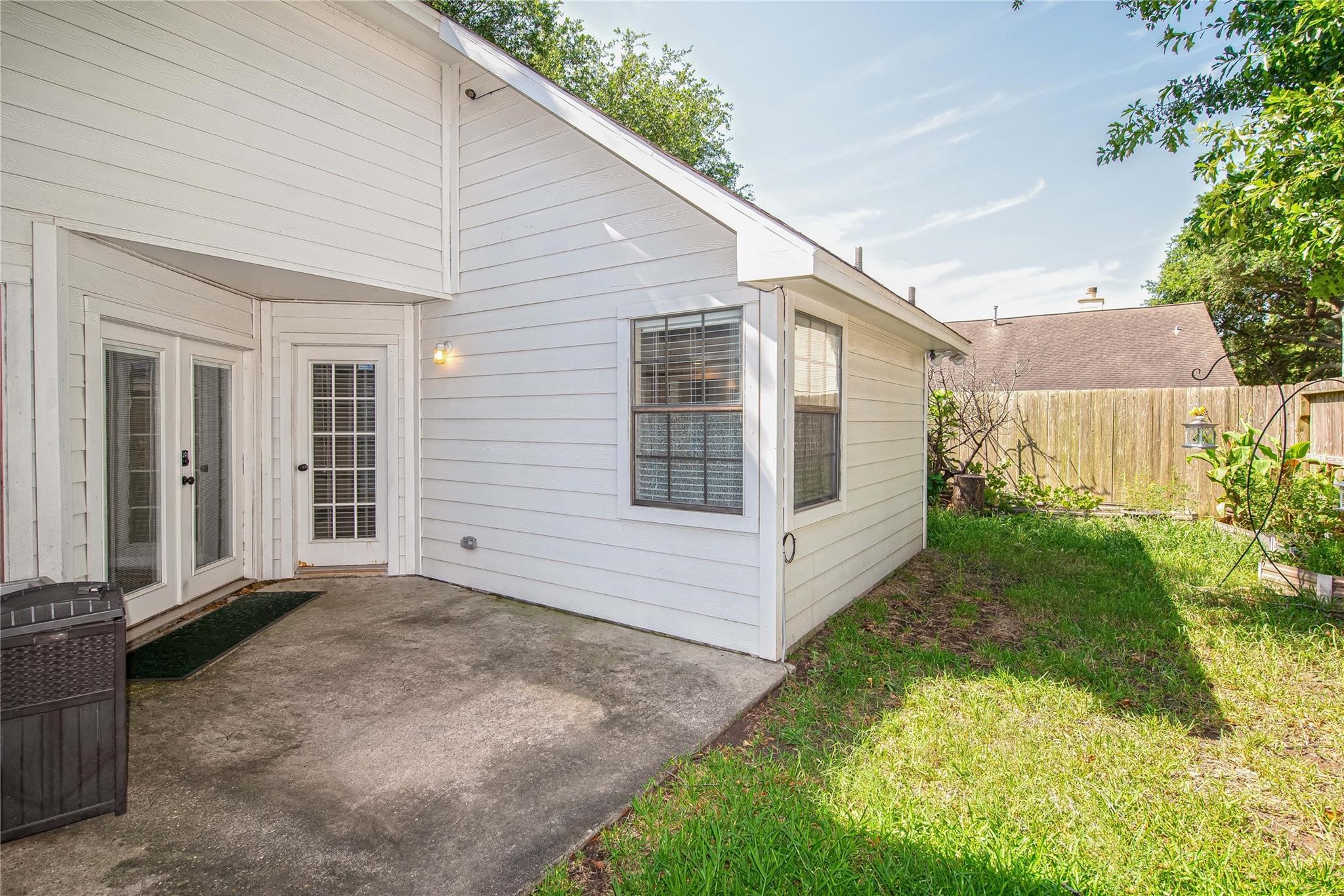 10131 Wayward Wind Lane Houston, TX 77064 - Photo 16 of 16 a view of a house with a yard