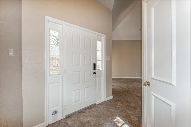 a view of a livingroom with wooden floor
