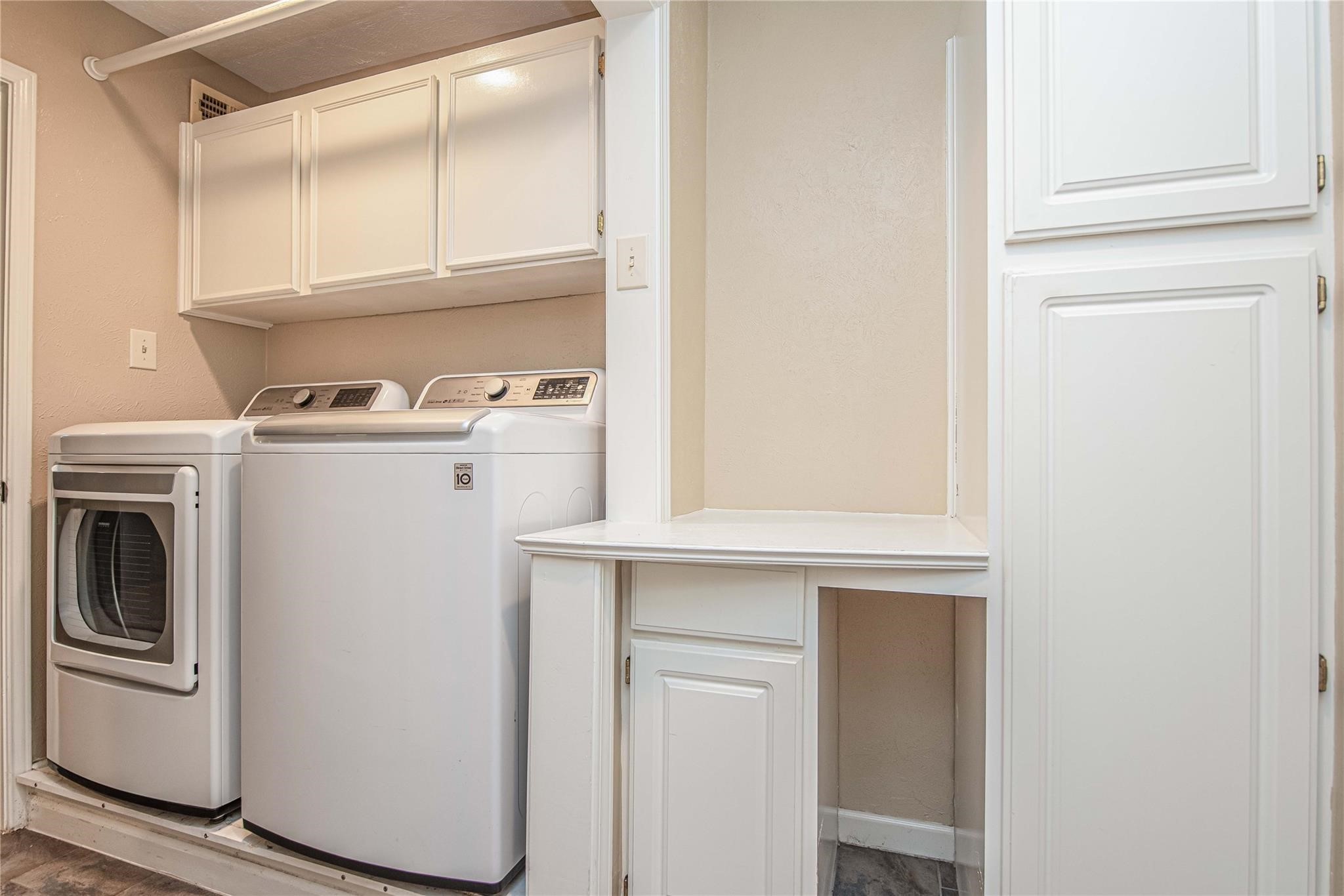 10131 Wayward Wind Lane Houston, TX 77064 - Photo 9 of 16 a stove top oven sitting inside of a kitchen