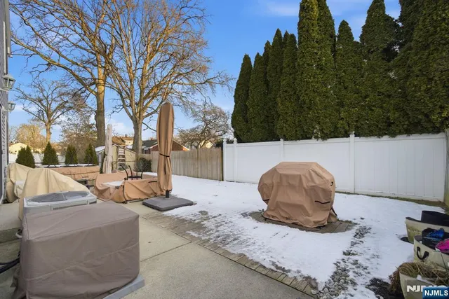 a view of a couches and a fire pit in the patio