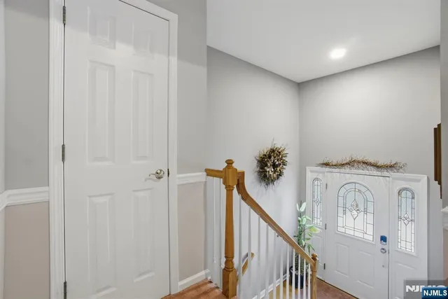 a view of entryway with wooden floor