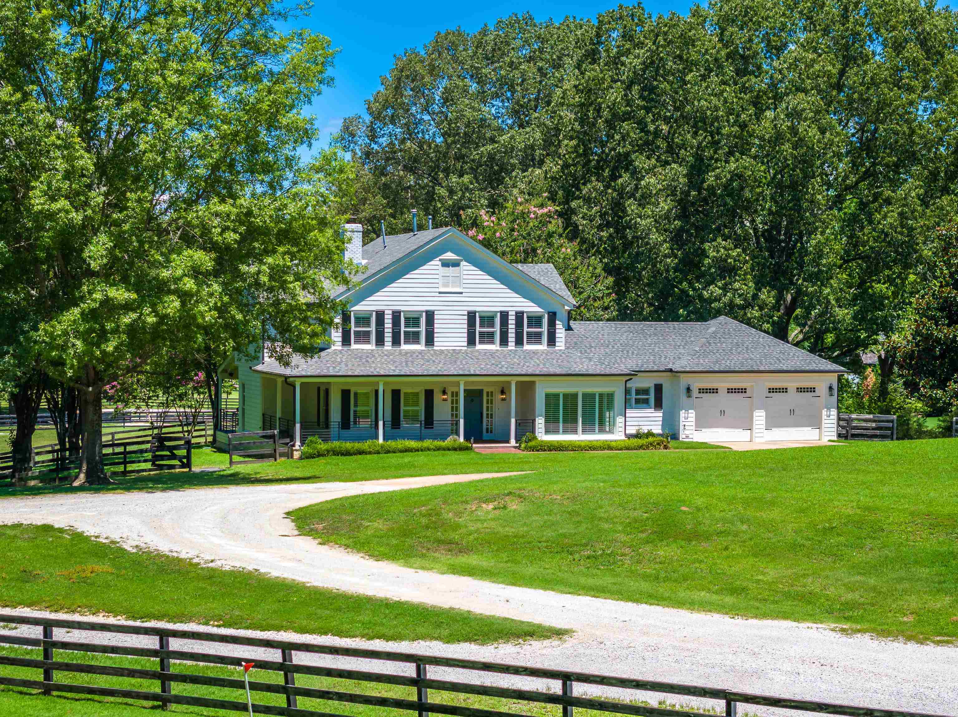 11830 Monterey Road Eads, TN 38028 - Photo 1 of 40 View of front facade featuring a porch, a garage, and a front yard