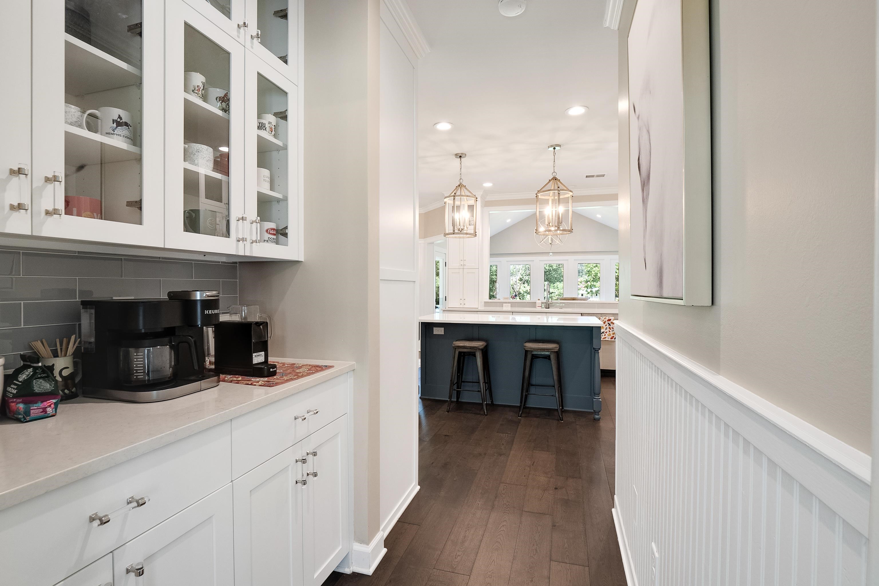 11830 Monterey Road Eads, TN 38028 - Photo 15 of 40 Bar with decorative light fixtures, white cabinetry, decorative backsplash, and dark wood-type flooring