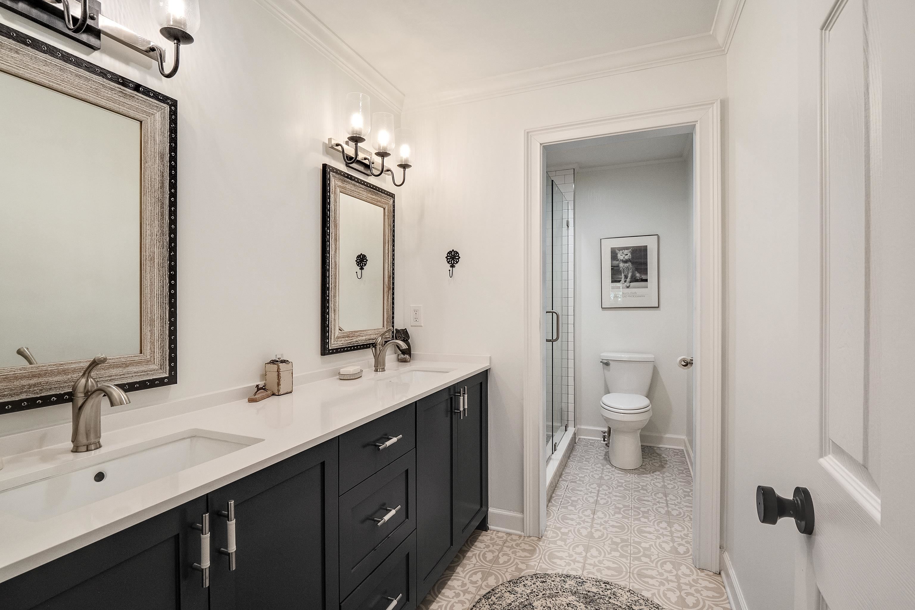11830 Monterey Road Eads, TN 38028 - Photo 25 of 40 Bathroom featuring dual vanity, tile patterned floors, crown molding, and toilet