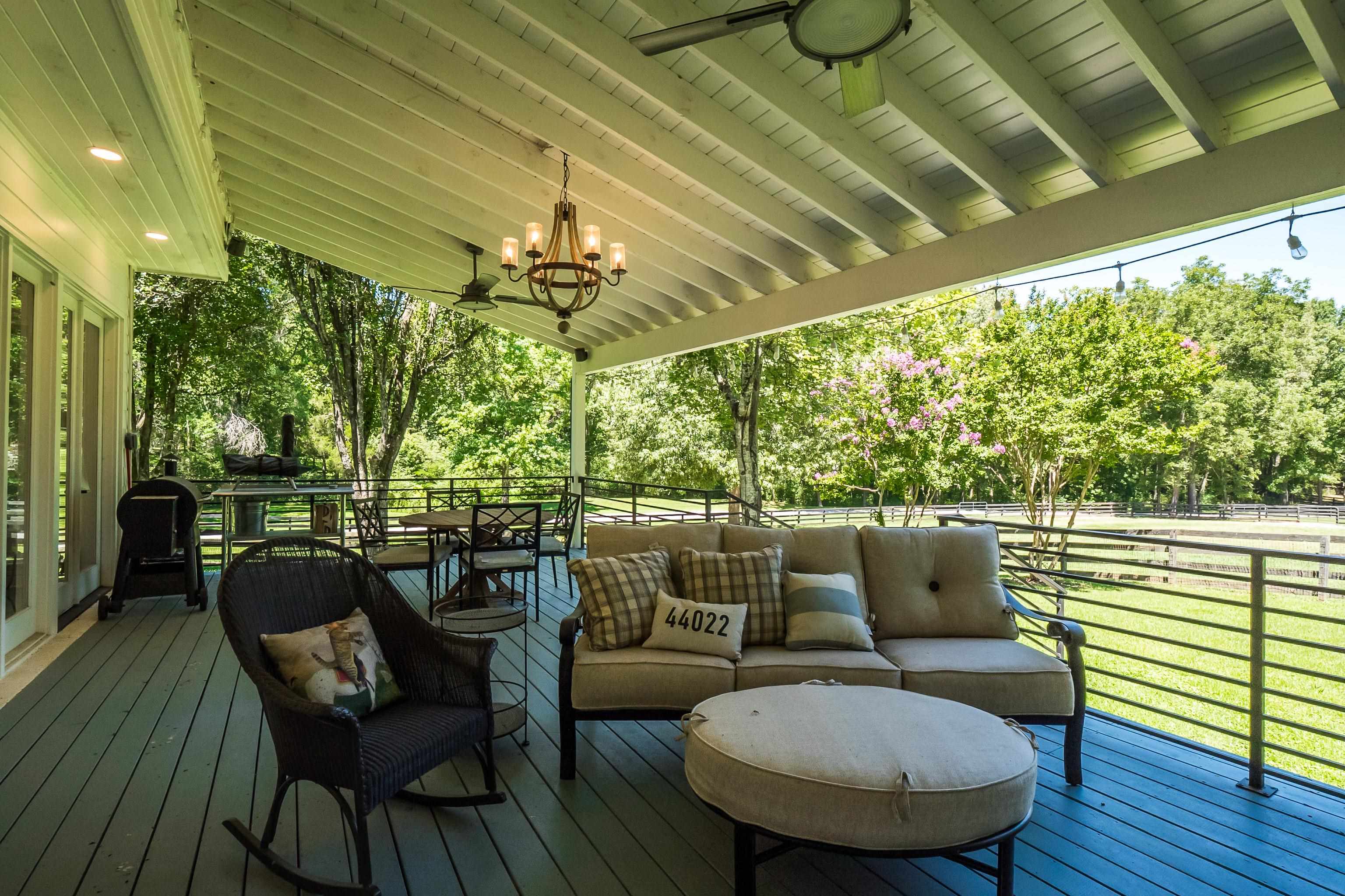 11830 Monterey Road Eads, TN 38028 - Photo 28 of 40 Wooden deck with outdoor lounge area, ceiling fan, and a lawn