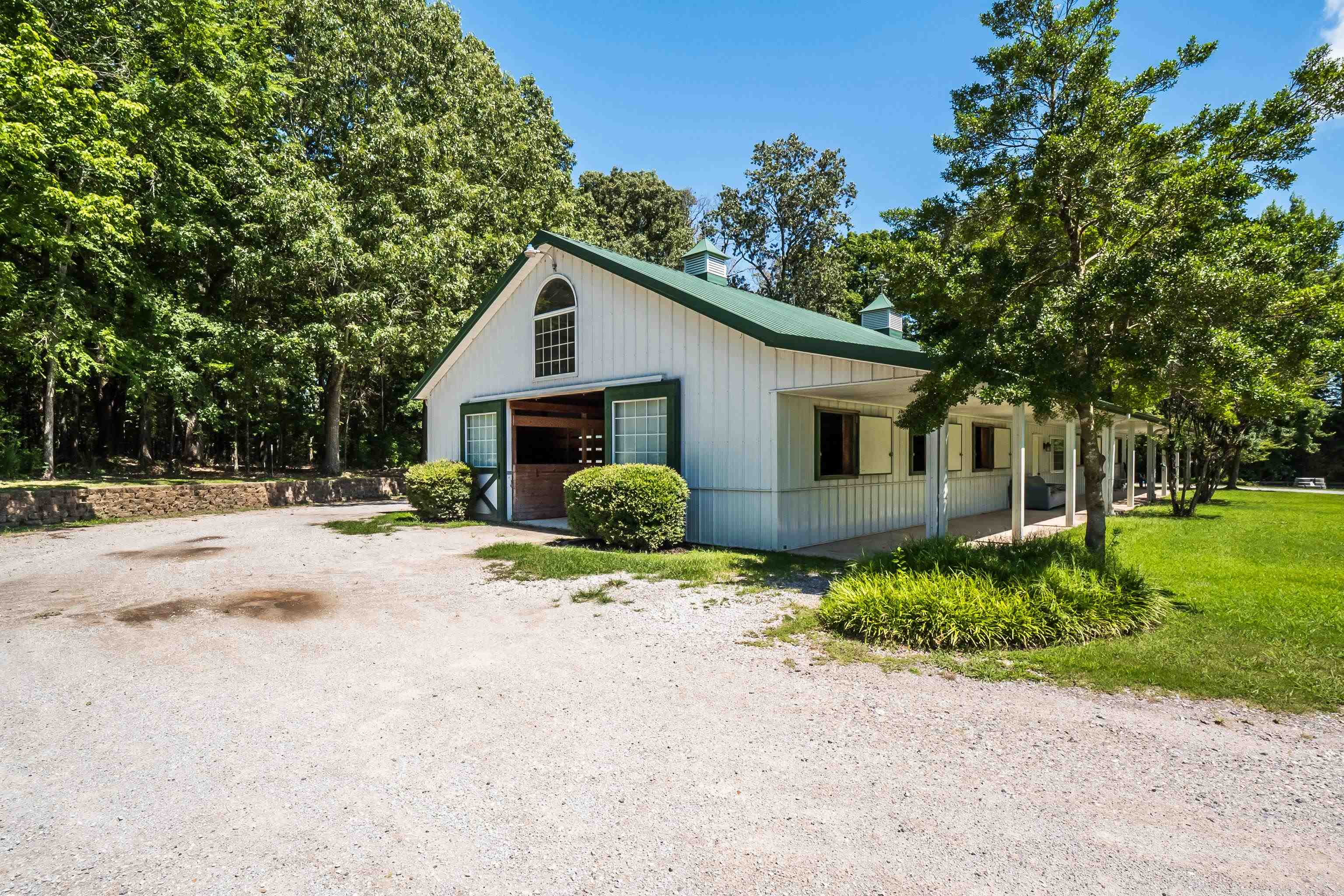 11830 Monterey Road Eads, TN 38028 - Photo 31 of 40 View of outbuilding featuring a porch and a lawn