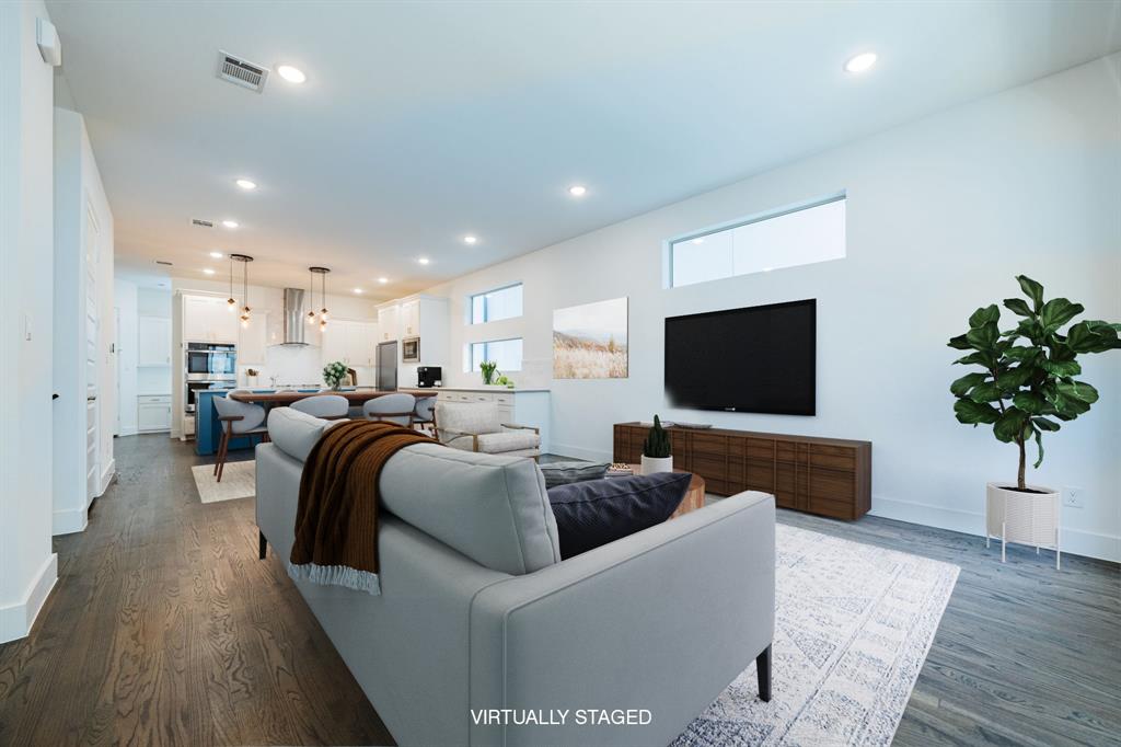 8106 Fallston Court Dallas, TX 75231 - Photo 11 of 40 a living room with furniture and a flat screen tv
