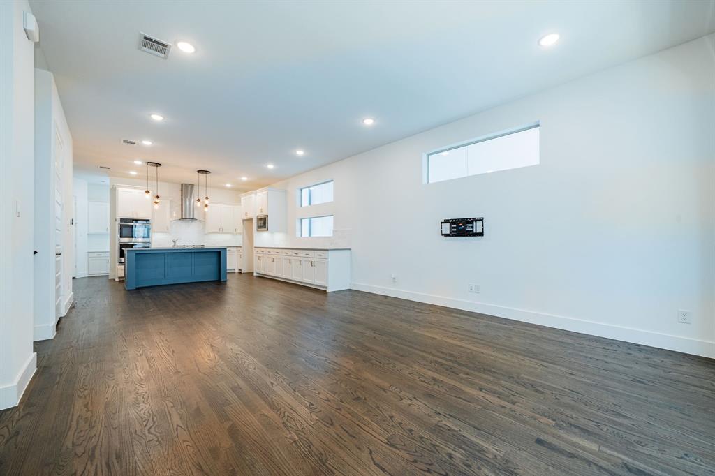 8106 Fallston Court Dallas, TX 75231 - Photo 12 of 40 a view of kitchen and hall with wooden floor