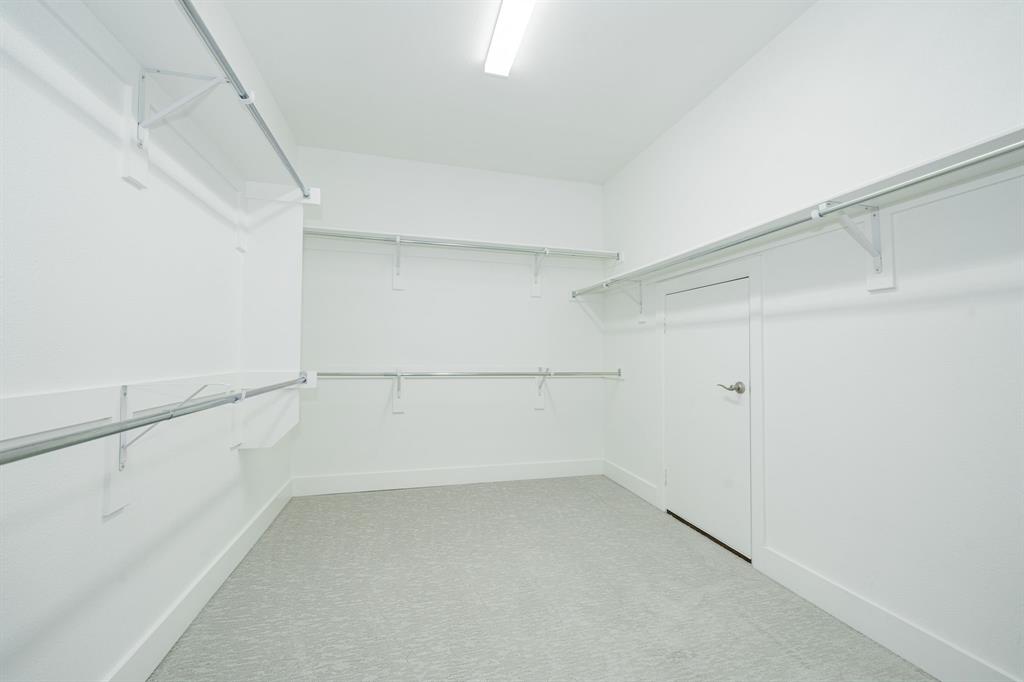 8106 Fallston Court Dallas, TX 75231 - Photo 30 of 40 a view of an empty walk in closet