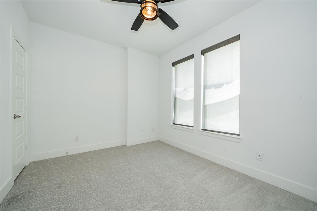 8106 Fallston Court Dallas, TX 75231 - Photo 34 of 40 an empty room with windows
