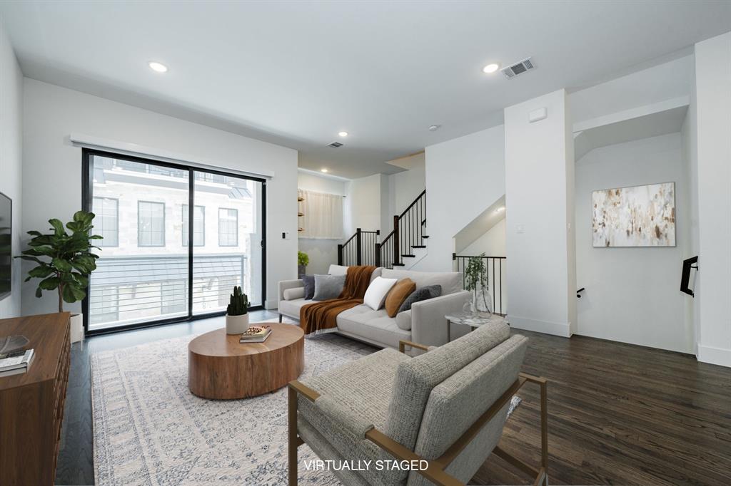 8106 Fallston Court Dallas, TX 75231 - Photo 7 of 40 a living room with furniture and a potted plant