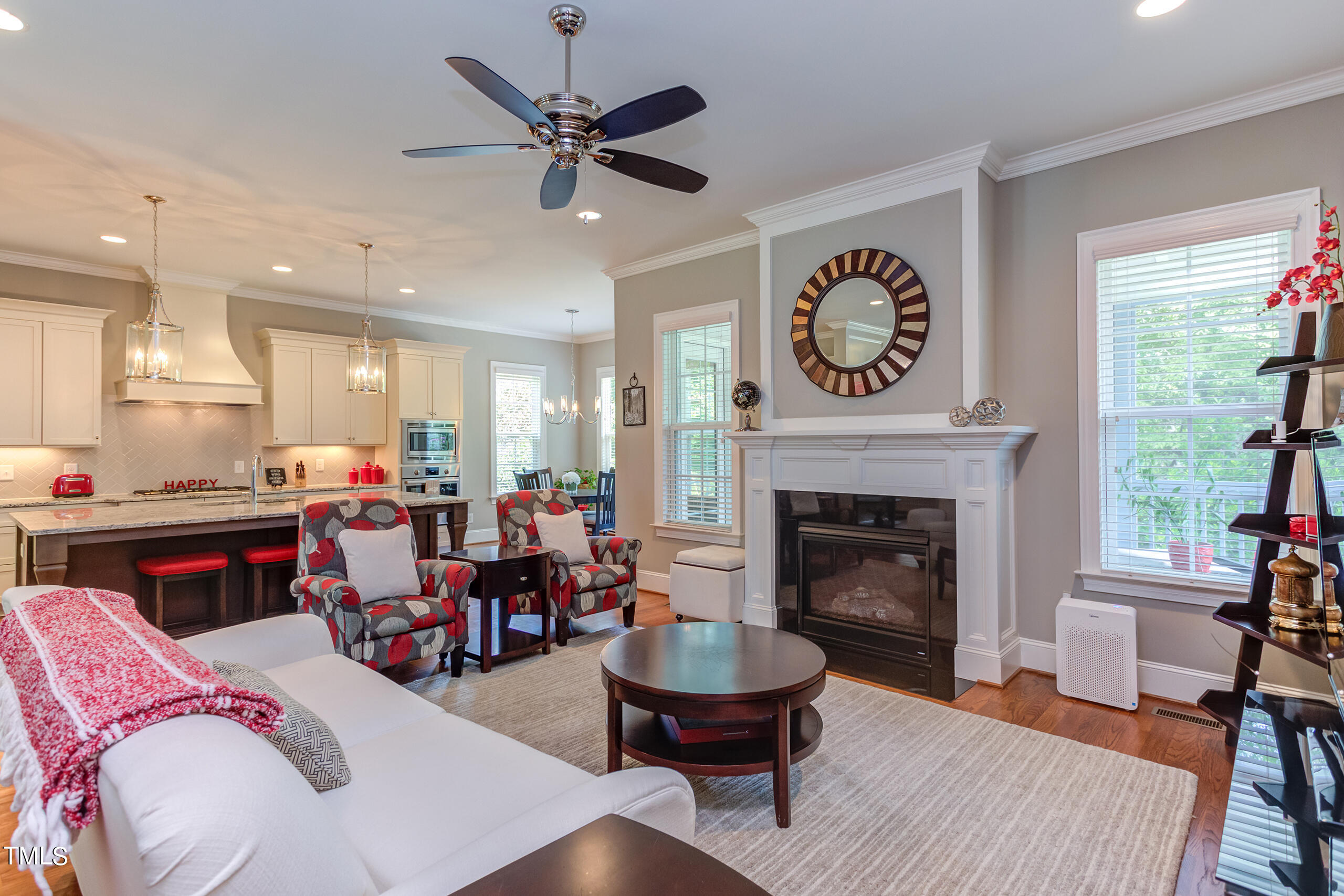6426 Rosny Road Raleigh, NC 27613 - Photo 20 of 51 a living room with furniture and a fireplace